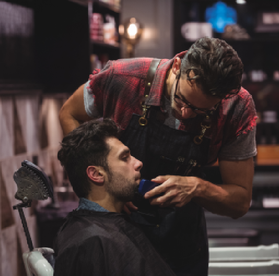 Professional barber providing a haircut near Rosenberg TX